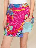 Multicolored Pink/Orange Graphic Design Skort with Front Pocket and Hidden Pocket in Under-short by Claire Desjardins.