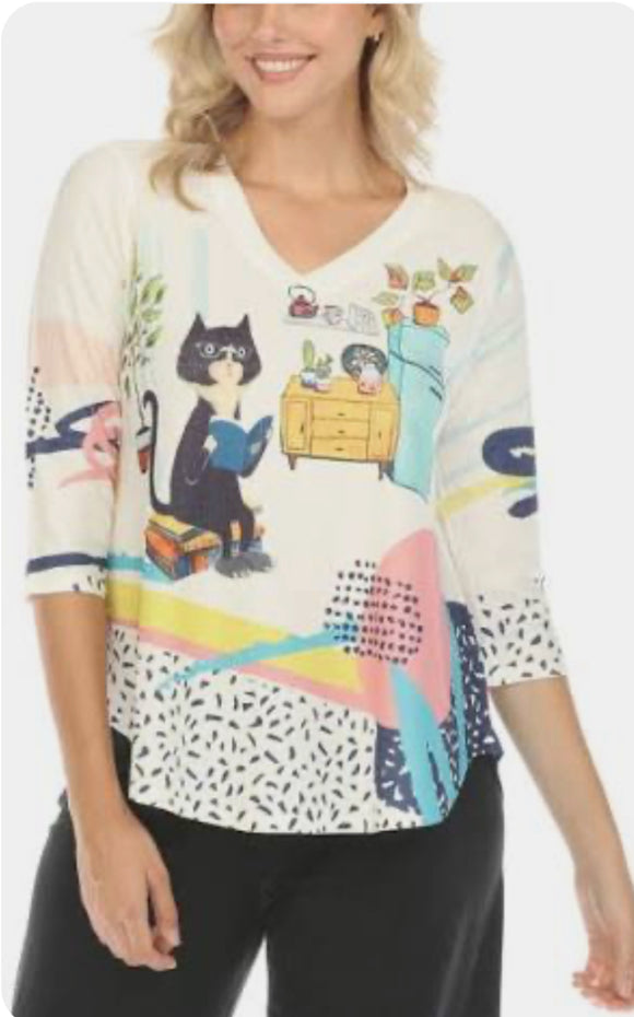White V-Neck, Short Sleeve Knit Top w/Multi Colored Print and Cute Mr. Rodger’s Cat Scene by Inoah.