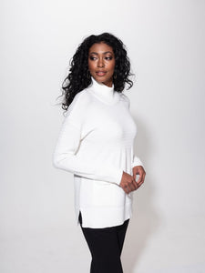 Cream Turtle Neck, Tunic Style Sweater With Front Pockets by Alison Sheri.