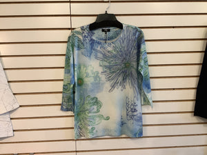 Soft Blue Sweater with Blue and Green Floral Design and Beading on Front Flower by Orly. Top with Charcoal and Soft Blue Pattern by Orly.