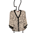 White V-Neck, Short Sleeve, Button Front Top with Black Border Trim and Black Scribble Print Design by Lior.