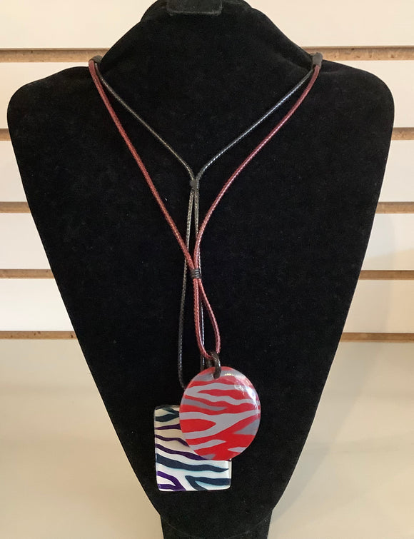 2 Medallions, Red/Grey and Black/white Black/Rust Cord Necklace